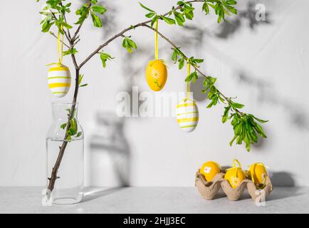 Seasonal decoration with Easter tree and colored eggs Stock Photo