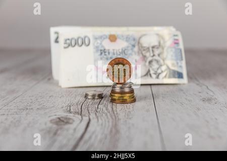 Czech banknotes and coins arranged on the table. Financial concept.Financial concept in Czech currency. business, finance, saving and cash concept - c Stock Photo