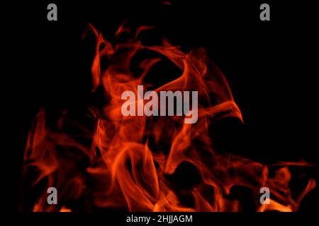 Close-up of flames from fire isolated on black background Stock Photo