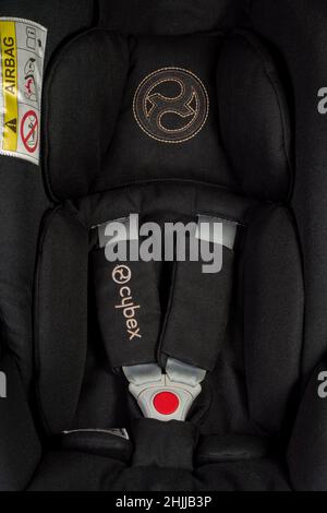 Close up of the five point seat belts on the Cybex Cloud Z i-size infant car seat with newborn insert installed Stock Photo