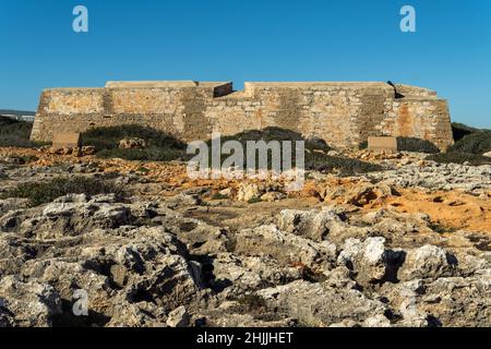 Old military building on the Mallorcan coast in the town of Cala d'Or, Es Forti. on a sunny morning Stock Photo
