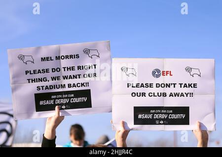 Derby, UK. 30th Jan, 2022. Derby fans hold up banners against the EFL outside the ground. EFL Skybet Championship match, Derby County v Birmingham City at Pride Park stadium in Derby on Sunday 30th January 2022. this image may only be used for Editorial purposes. Editorial use only, license required for commercial use. No use in betting, games or a single club/league/player publications. pic by Steffan Bowen/Andrew Orchard sports photography/Alamy Live news Credit: Andrew Orchard sports photography/Alamy Live News Stock Photo