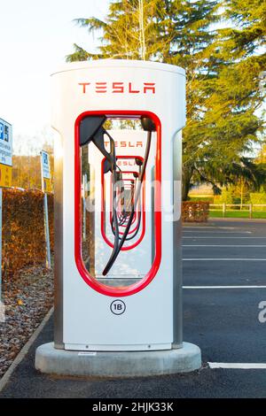 Row of Tesla Supercharger electric car charging stations at M42 ...