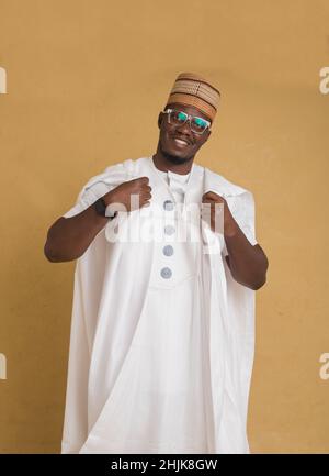 A Traditionally Dressed Northern Business Man Smiling Stock Photo