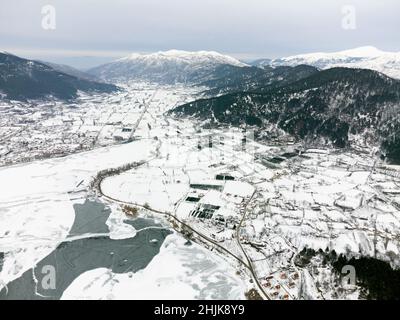 Aerial view of Frozen Golcuk lake and some mountains with Bozdag mountain at Odemis Izmir in winter season. Stock Photo