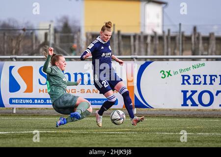 Andernach, Germany. 30th Jan, 2022. Andernach, Germany, January 30th Sam Drissen (15 Moenchengladbach) tackles Caroline Asteroth (21 Andernach) during the winter pre season friendly match between SG 99 Andernach and Borussia Moenchengladbach at the Andernach Stadium in Andernach, Germany. Norina Toenges/Sports Press Phot Credit: SPP Sport Press Photo. /Alamy Live News Stock Photo
