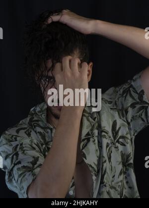 Hispanic handsome man posing for the camera Stock Photo