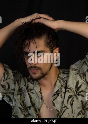 Hispanic handsome man posing for the camera Stock Photo