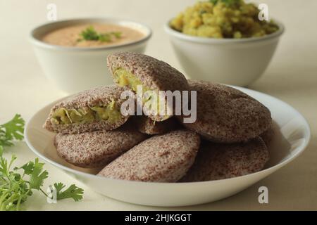 Steamed Cakes Made With Finger Millets And Skinned Black Gram. Locally ...