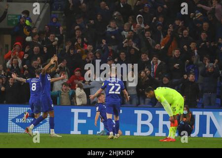 Cardiff, UK. 30th Jan, 2022. Issak Davies of Cardiff City (on ground) celebrates after he scores his teams 2nd goal. EFL Skybet championship match, Cardiff city v Nottingham Forest at the Cardiff City Stadium in Cardiff, Wales on Sunday 30th January 2022. this image may only be used for Editorial purposes. Editorial use only, license required for commercial use. No use in betting, games or a single club/league/player publications. pic by Andrew Orchard/Andrew Orchard sports photography/Alamy Live news Credit: Andrew Orchard sports photography/Alamy Live News Stock Photo