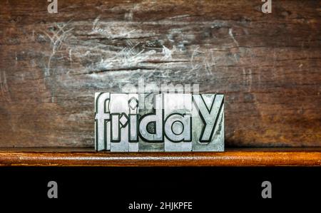 The day of the week Friday created with movable type printing on a shelf Stock Photo