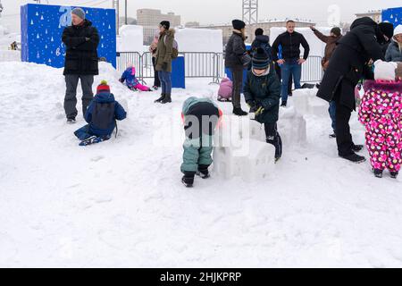 Moscow, Russia, 29.01.2022 children's master class on creating snow figures at the winter festival Snow and Ice in Moscow Stock Photo