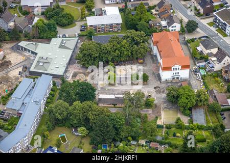 Aerial view, Caritas retirement home St. Josef, cathol. Heilig Kreuz Kirche, Haus der Begegnung, Herringen, Hamm, Ruhrgebiet, Nordrhein-Westfalen, Ger Stock Photo