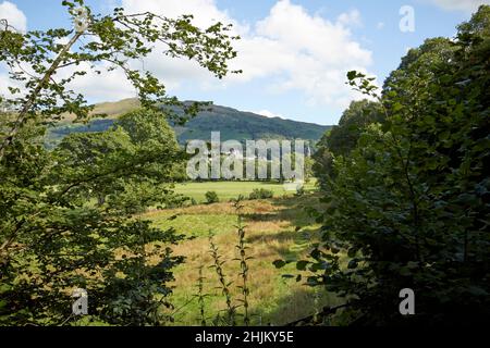 view from under loughrigg across river rothay valley and fields towards ambleside lake district, cumbria, england, uk Stock Photo