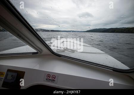 looking through window on a small boat out on lake windermere lake district, cumbria, england, uk Stock Photo