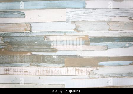 Close-up of a wooden imitation formed by pastel colored slats of light and different shades Stock Photo