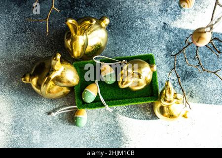 Place setting for festive Easter dinner using with golden bunnies Stock Photo