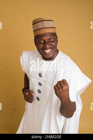 A Traditionally Dressed Northern Business Man Looking Excited Stock Photo