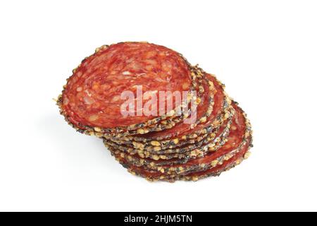 Stack of sliced cured meat isolated on white background.Dry smoked beef  thin slices Stock Photo