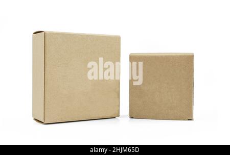 Two closed carboard boxes isolated on white background.  Blank, carton made packages Stock Photo