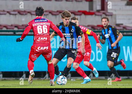 KORTRIJK, BELGIUM - JANUARY 30: Aleksandar Radovanovic of KV Kortrijk, Charles De Ketelaere of Club Brugge KV during the Jupiler Pro League match between KV Kortrijk and Club Brugge at Guldensporenstadion on January 30, 2022 in Kortrijk, Belgium (Photo by Ben Gal/Orange Pictures) Stock Photo