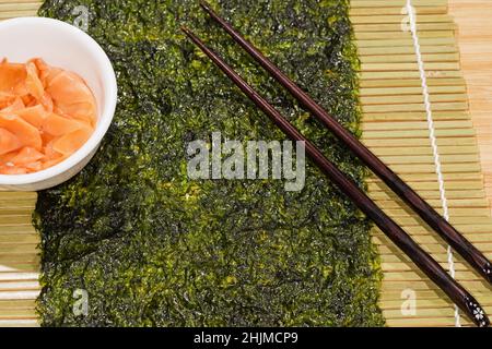 Sushi Roll On Bamboo Rolling Mat Stock Photo - Download Image Now - Asia,  Bamboo - Material, Chopsticks - iStock