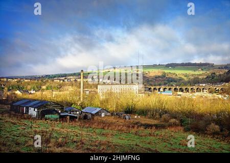 UK, West Yorkshire, Huddersfield, Slaithwaite, View from Manchester Road towards Spa Mill and Crumble Viaduct Stock Photo