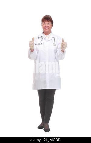Side view of mature female doctor gives the thumbs up Stock Photo