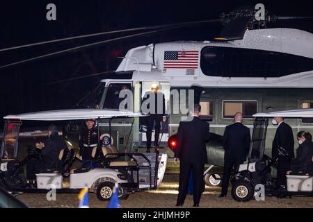 Mount Vernon, United States. 30th Jan, 2022. US President Joe Biden boards Marine One as the leaves George Washington's Mount Vernon home after attending the National Governors Association's black tie dinner in Mount Vernon, Virginia USA, 30 January, 2022. Credit: Sipa USA/Alamy Live News Stock Photo