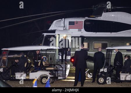 Mount Vernon, United States. 30th Jan, 2022. US President Joe Biden boards Marine One as the leaves George Washington's Mount Vernon home after attending the National Governors Association's black tie dinner in Mount Vernon, Virginia on Sunday, January 30, 2022. Photo by Jim Lo Scalzo/UPI Credit: UPI/Alamy Live News Stock Photo