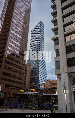 Glass office towers in Calgary downtown business district with trees of ...