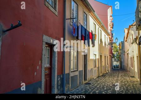 Alfama Lisboa district narrow street colored houses, Lisbon, Portugal Stock Photo