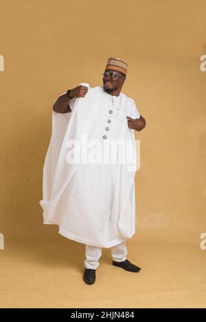 A Traditionally Dressed Northern Business Man Dancing Stock Photo