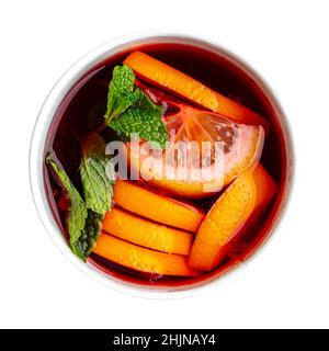 Isolated cup of berry tea with lemon and mint Stock Photo