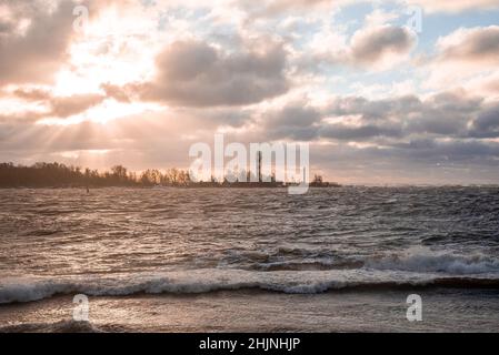 Thunder storm waves crashing on the beach Stock Photo