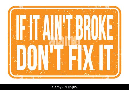 IF IT AIN'T BROKE DON'T FIX IT, words written on orange rectangle stamp sign Stock Photo