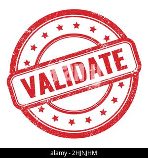 VALIDATE text on red grungy vintage round rubber stamp. Stock Photo