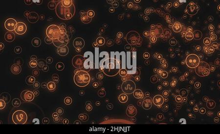 Colorful abstraction of popular social networks and services app icons floating on the black background. Technology, social media and internet backdro Stock Photo