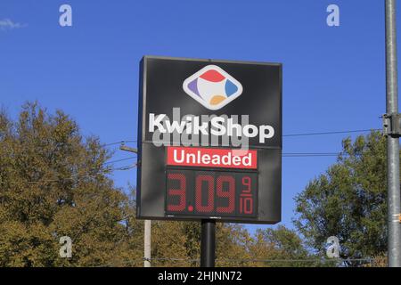 Quick Shop Signs Kwik Shop advertisement sign with blue sky Stock Photo - Alamy