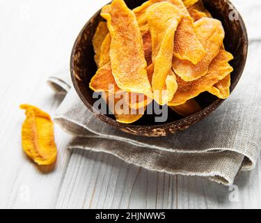 Dried Mango Fruit on Old Wooden Background Stock Photo