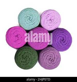 Colorful macrame yarns isolated on white background. Flat lay of natural cotton macrame yarn rolls Stock Photo