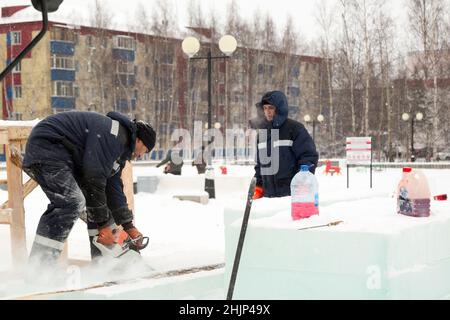 Workman assembler customize chainsaw ice plate Stock Photo