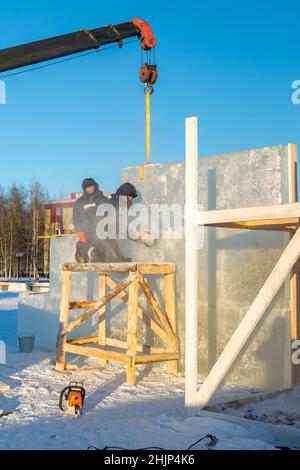 Workman assembler customize chainsaw ice plate Stock Photo