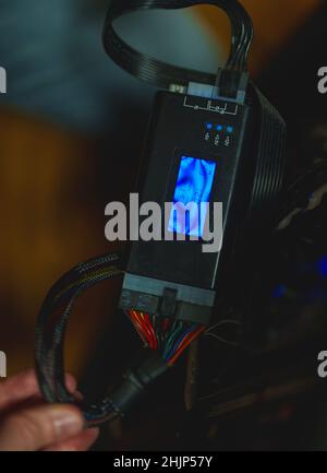 Power supply tester for personal computer. Stock Photo