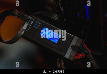 Power supply tester for personal computer. Stock Photo