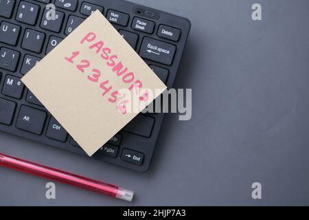 writing password on a sticky note  Stock Photo