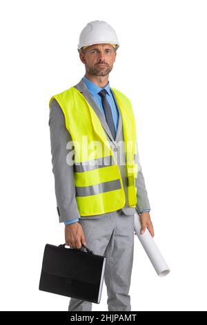 Male construction architect in formal suit and hardhat with rolled blueprints looking at camera isolated on white background Stock Photo