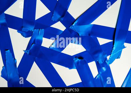 Torn blue sticky tape of different sizes isolated on a white background, abstract pattern of pieces of duct tape isolated on a white background, stick Stock Photo