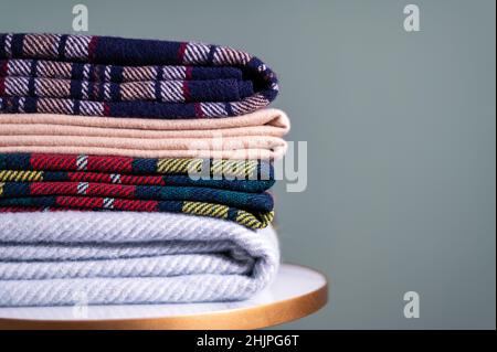 Stack of woolen checked blankets Stock Photo