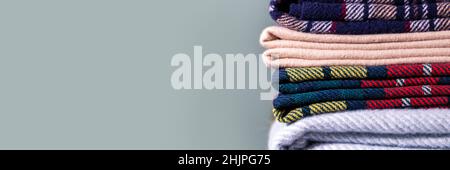 Stack of woolen checked blankets Stock Photo